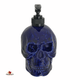 Dark blue ceramic skull soap dispenser.