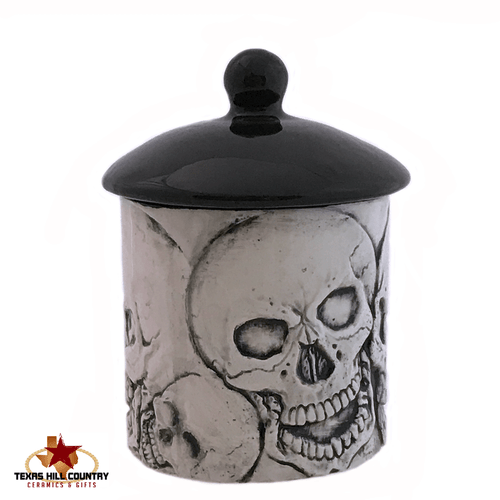 Antique black skull sugar bowl or container with lid.