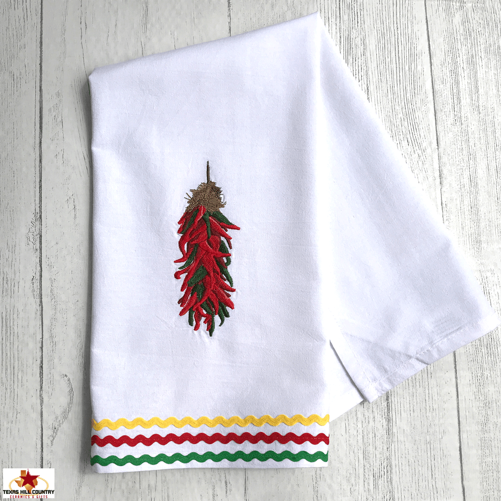 https://cdn9.bigcommerce.com/s-8nf14co6/products/1141/images/5976/Chili-rista-kitchen-towel-2-1500__44290.1557890485.1000.1000.gif?c=2