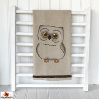 Baby owl embroidered on kitchen towel.