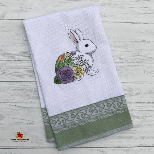 Floral bunny rabbit embroidery on white towel green trim, perfect for Easter time.