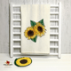 Ceramic sunflower spoon rest complements the painted sunflower design.