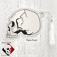 White skull bookmark or ornament.