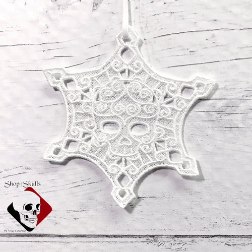 White Skull snowflake Ornament for your favorite haunt.