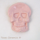Pink skull tea bag rest