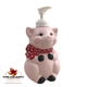 Pink pig with bow in red with white dots made in the USA.