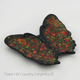 The wings of this butterfly teabag rest are finished with a stain glass look