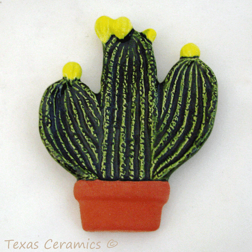 Cactus with yellow blooms or buds in terracotta pot tea bag holder or small spoon rest