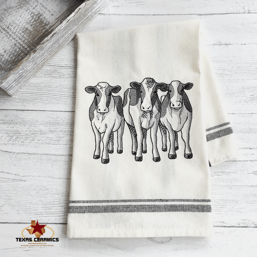https://cdn9.bigcommerce.com/s-8nf14co6/products/1260/images/7046/Three-cows-dish-towel-1-5x5__15488.1681658931.1000.1000.gif?c=2