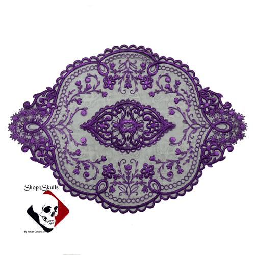 Black organza lace doily with fancy Victorian floral design in purple.