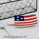 This ceramic tea bag rest with the American Flag design is Made in the USA