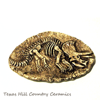 Small ceramic fossil stone cast of ancient Triceratop - great as a tea bag holder or desk accessory