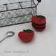 This petite ruby red apple tea bag holder stacks well for saving space
