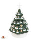 Small green ceramic Christmas tree with snow for home or office.