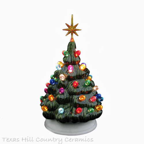 Small green ceramic Christmas tree made in the USA.