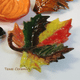 This maple leaf tea bag rest is finished in vibrant autumn shades