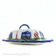 Oval dome butter dish with hand painted Texas bluebonnet wildflowers, made in the USA.