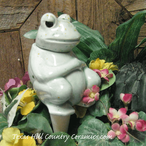 Sitting frog plant tender in Herb Garden made in the USA.