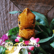 Use this brown owl plant tender to keep the soil moist in container gardens.
