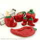 Perfectly coordinating red cili pepper items available.
