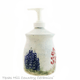 Ceramic thrown pottery canister style soap dispenser with Texas Bluebonnet Wildflowers.