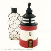 Lighthouse soap dispenser for bath or kitchen, made in the USA.