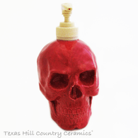 Red ceramic skull soap dispenser for bath vanity or kitchen counter, Halloween decor.
