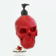 Red skull dispenser with black pump unit.