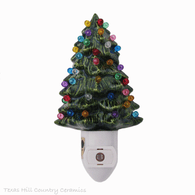 Green ceramic Christmas tree night light with color globe lights, great for gift giving or to add Christmas cheer to any area of the home or office.