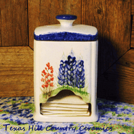 Ceramic tea bag canister and lid with hand painted Texas Bluebonnet and Indian Paintbrush wildflowers.