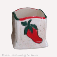 Square toothpick holder with hand painted red chili pepper design.