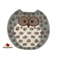Large round owl spoon rest by Texas Ceramics.