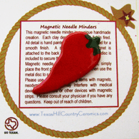 Red chili pepper magnetic needle minder made in the USA.