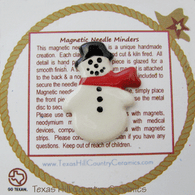 This Snowman with a red scarf is a magnetic needle minder with Neodymium Magnet, ideal as a Sewing Accessory and used by Cross Stitch or Embroidery enthusiast.  Made in the USA