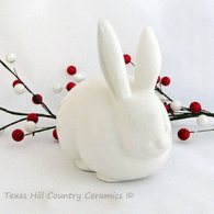 Ceramic bunny cotton ball holder for bath vanity.