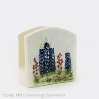Ceramic napkin holder with hand painted Texas Bluebonnet wildflowers made in the USA.