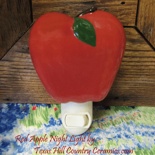 Red apple night light with UL approved auto on/off switch for USA wall plugs.