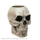 Aged skull holder.