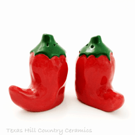 Collectible chili pepper salt and pepper shakers made in Texas USA.