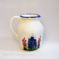 Antique style pitcher or utensil holder with hand painted Texas Bluebonnet wildflowers made in Texas.