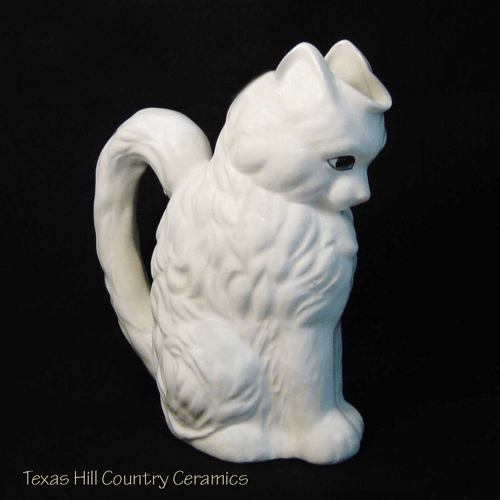 White ceramic cat pitcher made in the USA.