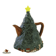 Christmas tree teapot with children's gifts on bottom edge, hand made in the USA.