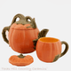 Pumpkin Teapot with coordinating items.