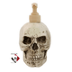Aged skull soap dispenser for Halloween or alternative decor with tan pump unit.