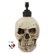 Old looking skull soap pump dispenser made in the USA with black pump unit.
