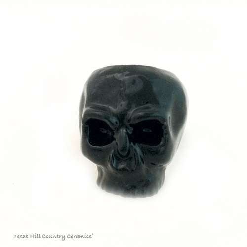 Black skull napkin ring.