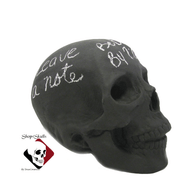 Large chalk board skull for messages or doodling with stick chalk.