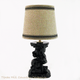 This skull lamp base has a drum style shade in tan linen with black trim, the shade measures 7 1/2 inches in diameter x 6 1/2 inches high.  Shade is not included with the lamp base.